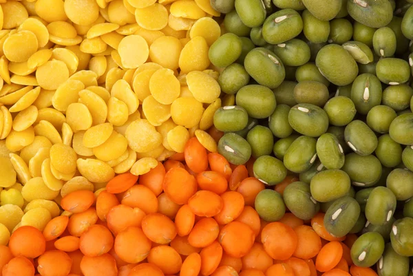 Yellow split, red "football" lentils and green mung beans — Stock Photo, Image
