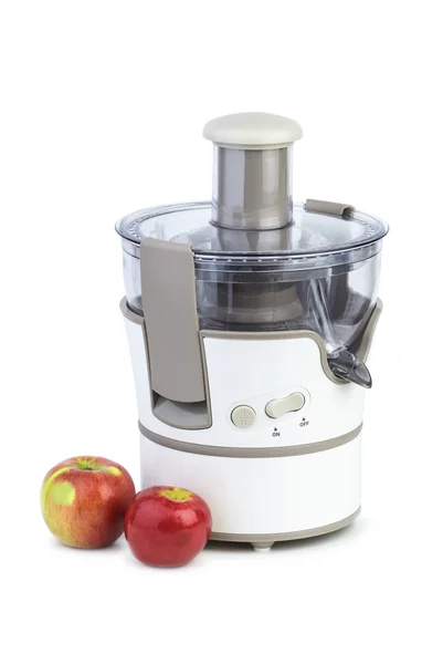 Electrical juicing machine and two apples — Stock Photo, Image