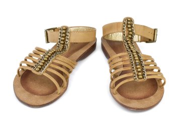 Pair of brown leather female sandals clipart