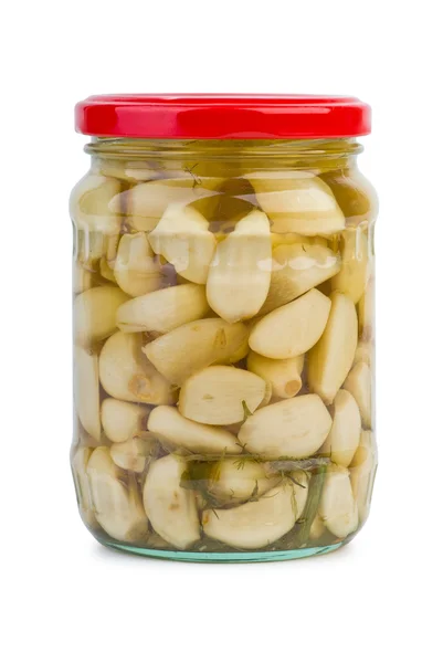 Glass jar with marinated garlic — Stock Photo, Image