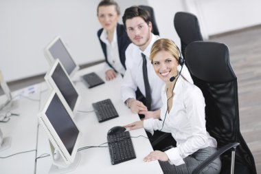 Business group working in customer and help desk office clipart