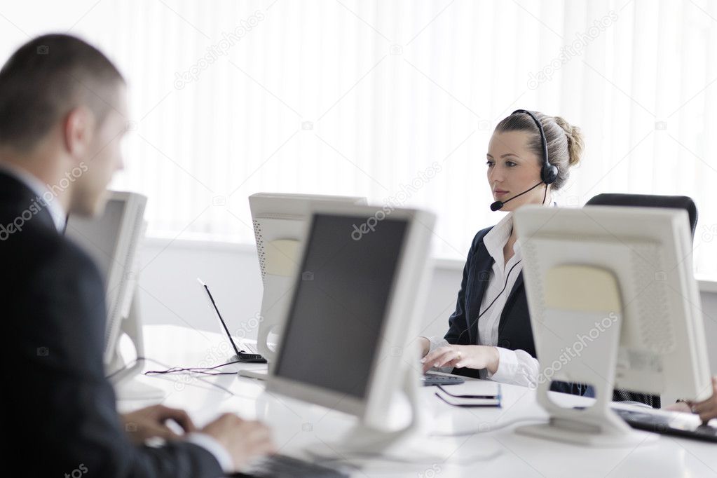 Business Group Working In Customer And Help Desk Office Stock