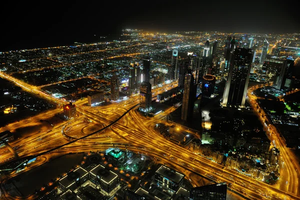 Panorama över ner staden dubai city på natten — Stockfoto