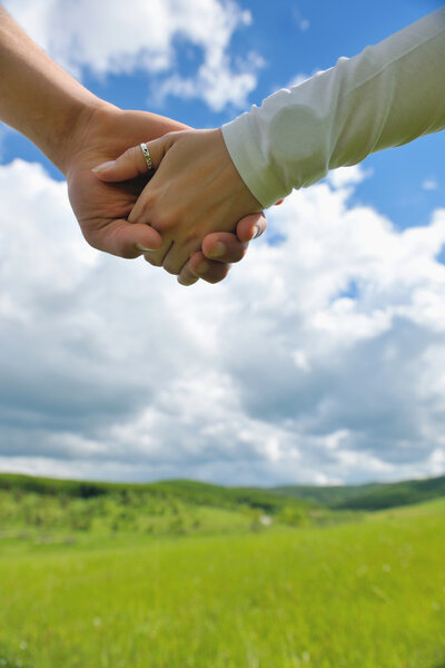 Portrait of romantic young couple smiling together outdoor