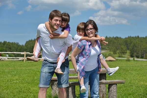 Happy young family have fun outdoors Royalty Free Stock Images