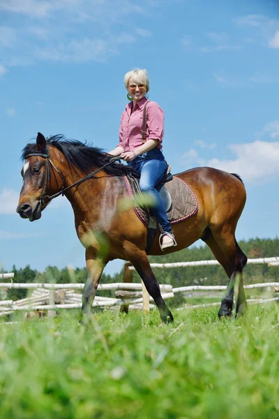 Happy woman on horse — Stock Photo, Image