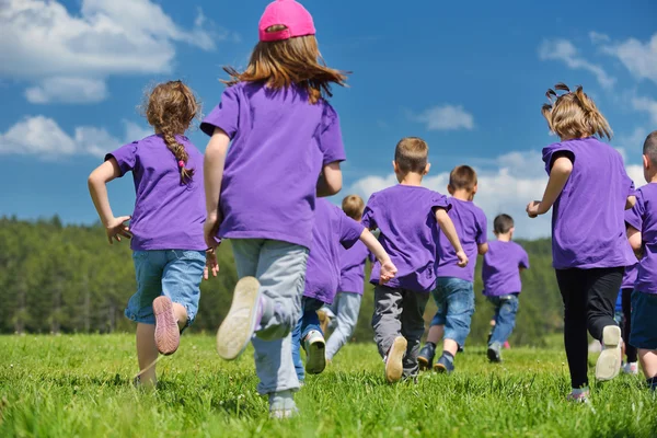 Happy kids group have fun in nature — Stock Photo, Image