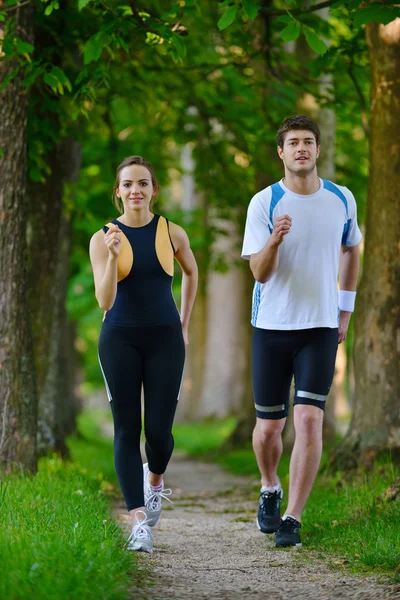 Young couple jogging — Stock Photo, Image