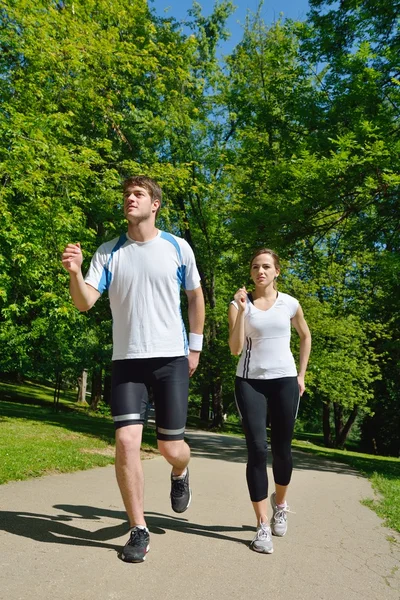 Young couple jogging — Stock Photo, Image