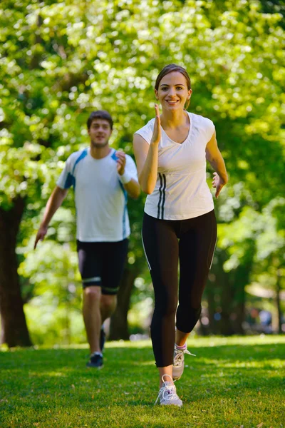 Mladý pár, jogging — Stock fotografie