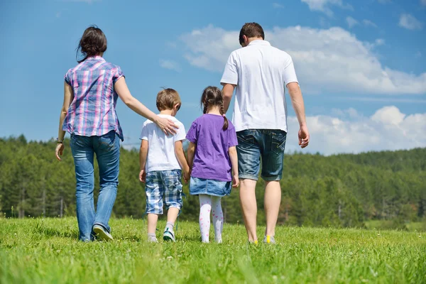 Happy young family have fun outdoors — Stock Photo, Image