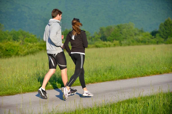 若いカップル ジョギング ロイヤリティフリーのストック画像