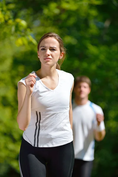 Young couple jogging Stock Photo
