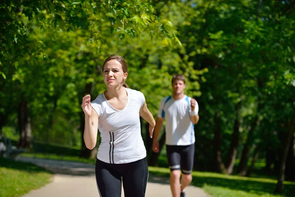 Young couple jogging Stock Photo