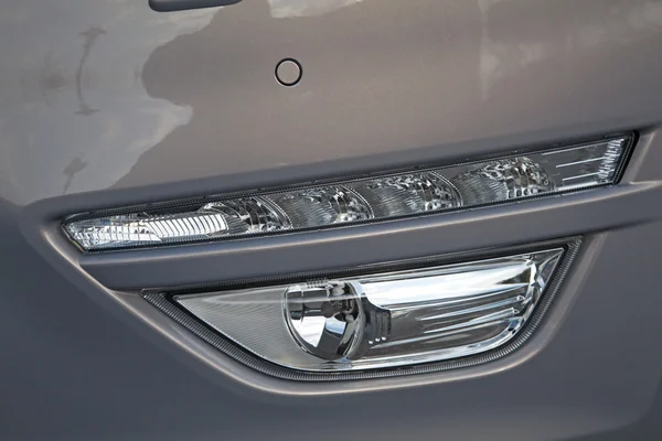 Close up of modern car headlight — Stock Photo, Image
