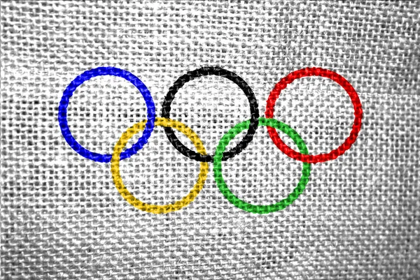 Olympische Ringe texturierte Flagge — Stockfoto