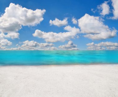 Turquoise sea under clouds clipart