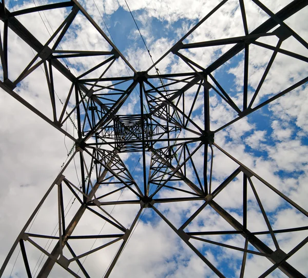 stock image Steel pylon on blue sky with clouds