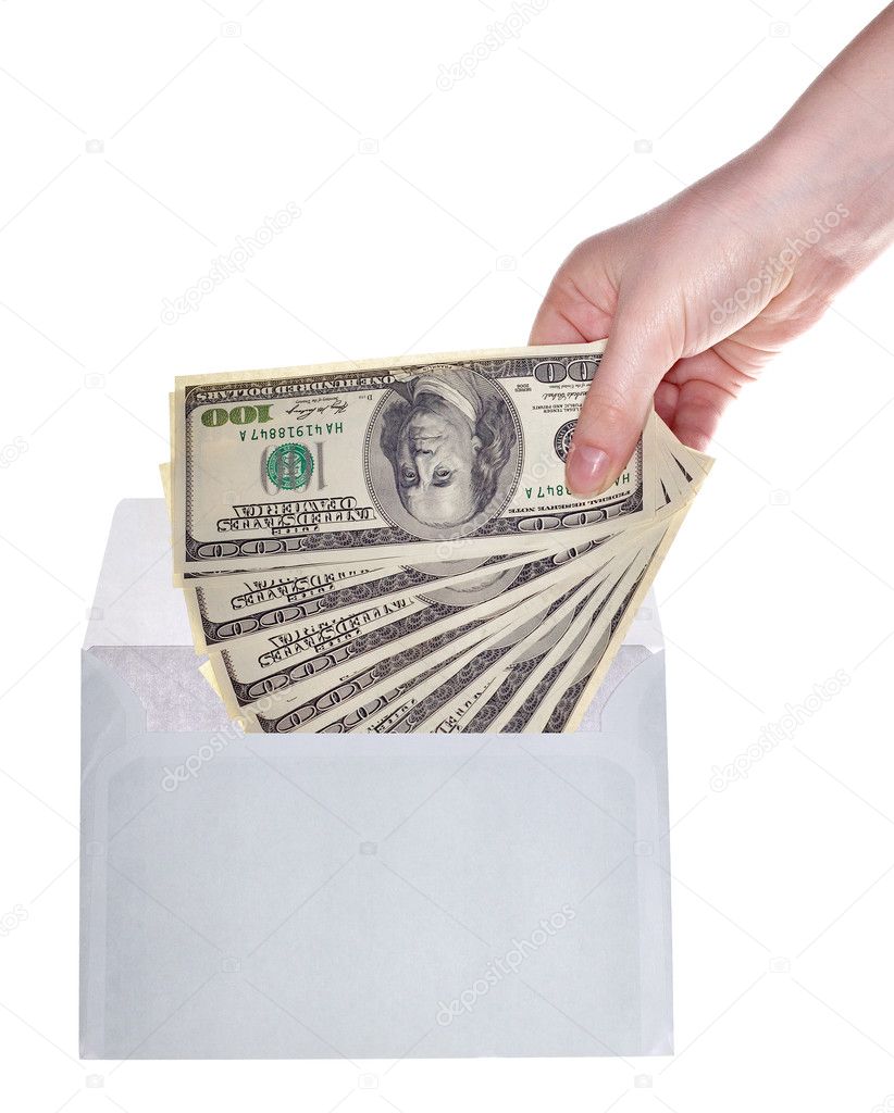 Woman hand put money in light envelope