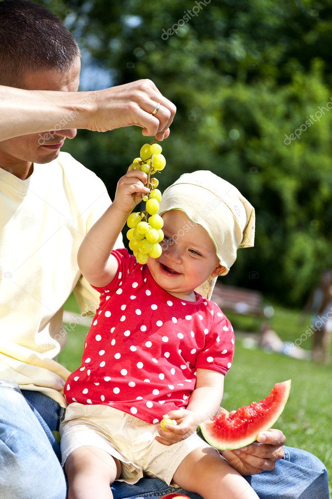 Baby With Father On Picnic