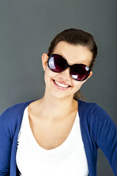Frau mit Brille lizenzfreie Stockbilder