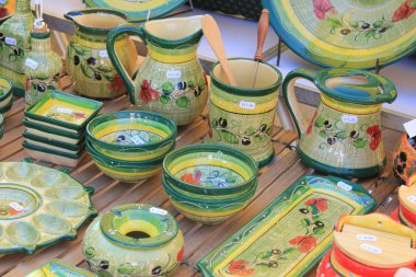 Pottery in many bright colors clipart