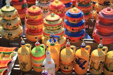 Traditional pottery on a market in the Provence clipart