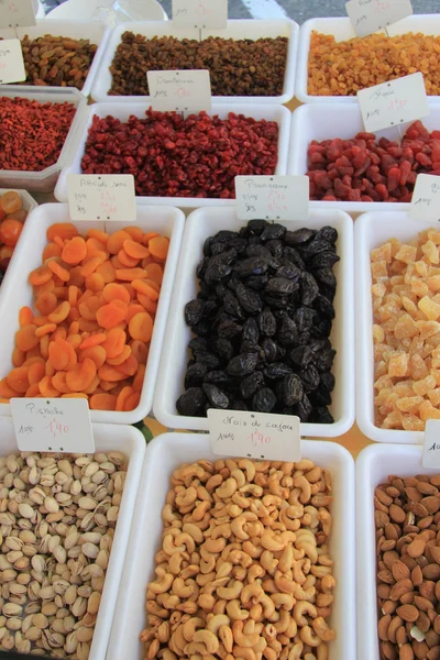 Nuts, raisins and dried fruit on a french market — Stock Photo, Image
