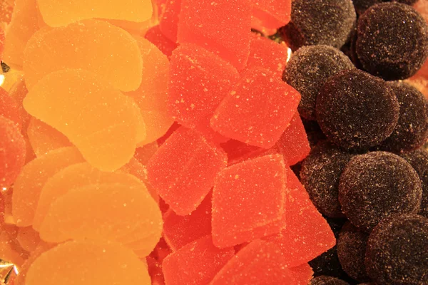 Doces de frutas cristalizadas no mercado — Fotografia de Stock