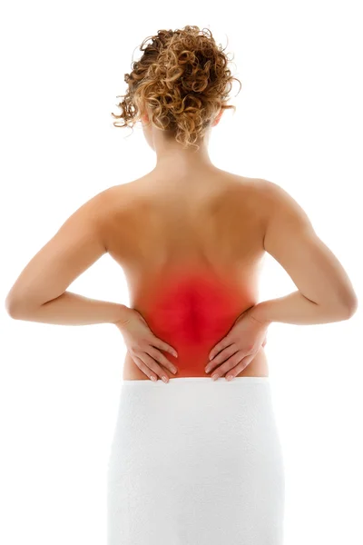 Mujer masajeando dolor de espalda aislado sobre fondo blanco —  Fotos de Stock