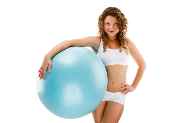 Beyaz arka plan üzerinde egzersiz genç bir kadın — Stok fotoğraf
