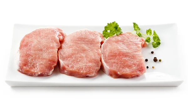 Friss nyers sertéshús, fehér háttér — Stock Fotó