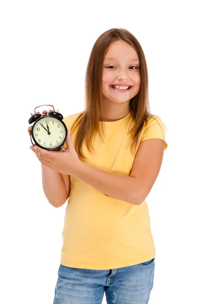白い背景で隔離の目覚まし時計を保持している女の子 — ストック写真