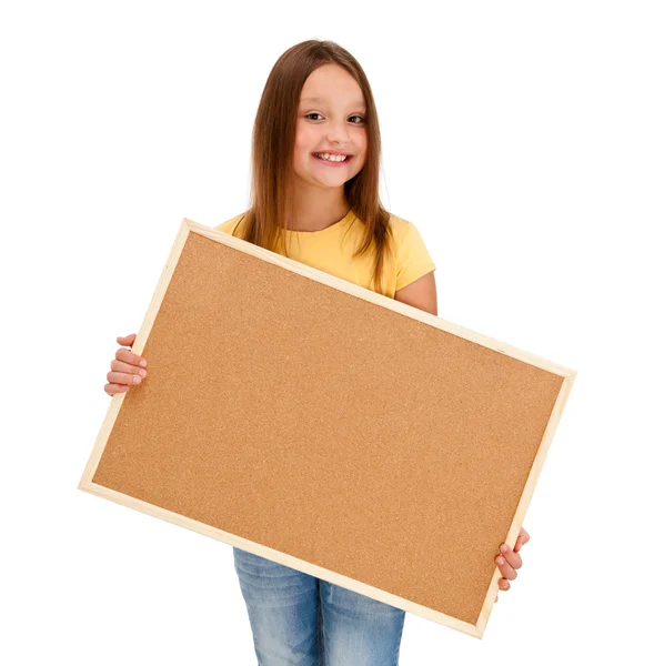 Dívka drží nástěnka izolovaných na bílém pozadí — Stock fotografie