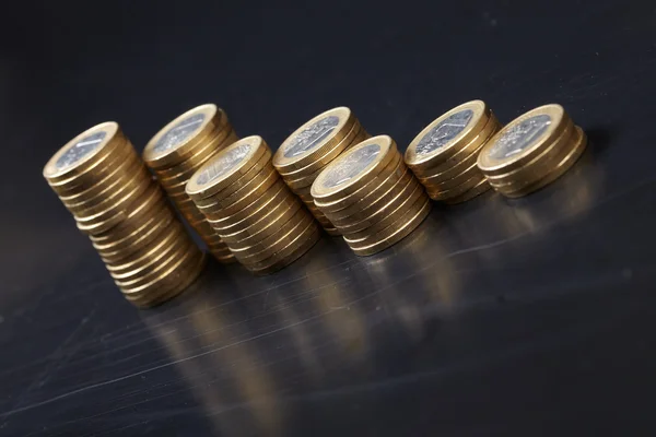 stock image Coins on the black background