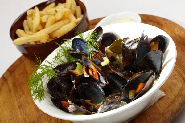 Mussels with french fries — Stock Photo, Image
