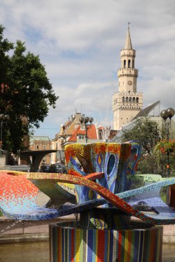 Fountain on square in Oppeln town clipart