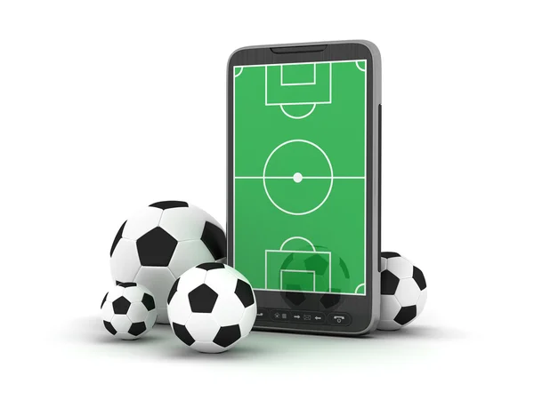 Telefone celular e bolas de futebol no fundo branco — Fotografia de Stock