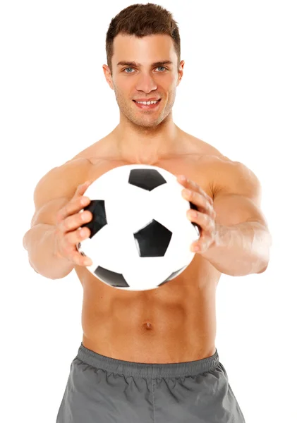 Jovem musculoso feliz segurando bola de futebol sobre branco — Fotografia de Stock