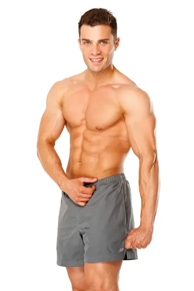 Hombre musculoso guapo aislado en blanco — Foto de Stock