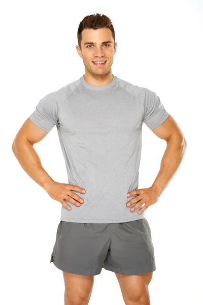 Jovem muscular saudável isolado em branco — Fotografia de Stock