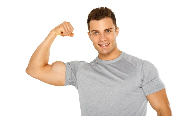 Przystojny mięśni mężczyzna młody na białym tle — Zdjęcie stockowe