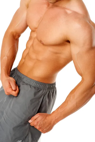 Torso de jovem homem musculoso, isolado no fundo branco — Fotografia de Stock