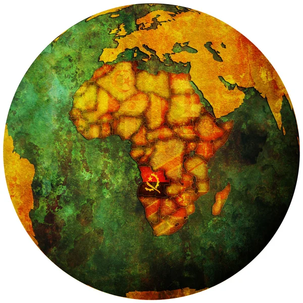 Angola faso vlag op globe kaart — Stockfoto