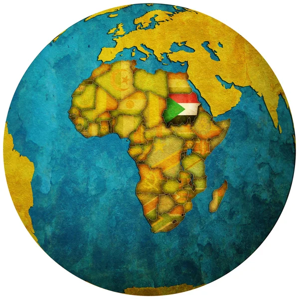 Súdán vlajka na mapě světa — Stock fotografie