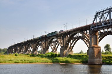 Big bridge through the river Volga in Russia clipart
