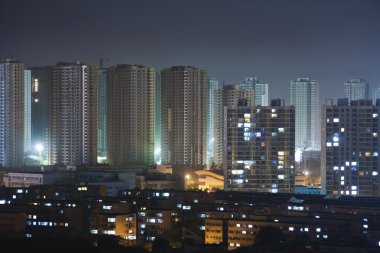 A typical Chinese city, the construction of new homes. Night vie clipart