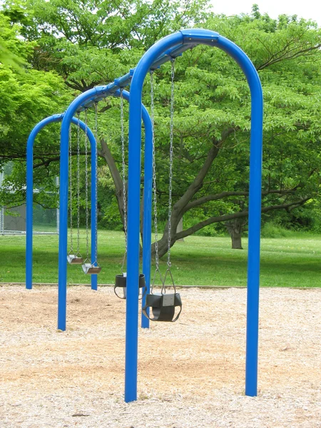 Swings in park — Stock Photo, Image