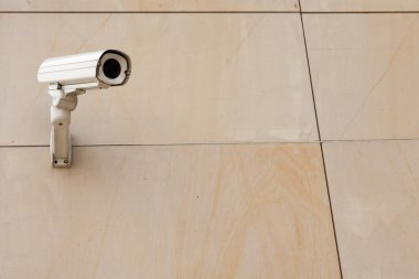 Security cameras on marble wall clipart