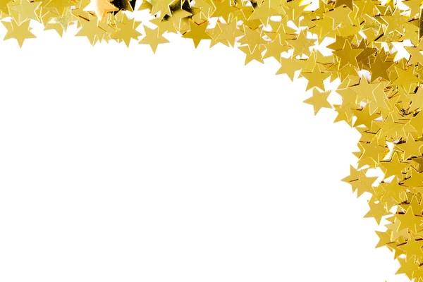 Kerstdecoratie van de gouden confetti sterren — Stockfoto
